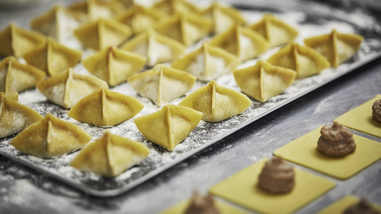 A dish with seasoned pasta shells on a platter