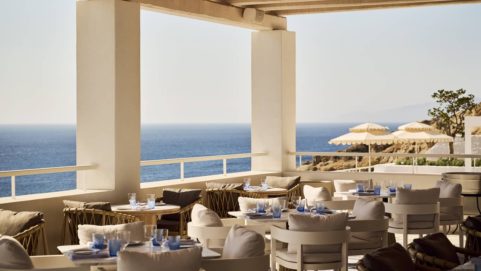 Elegant restaurant under a pergola with sea view