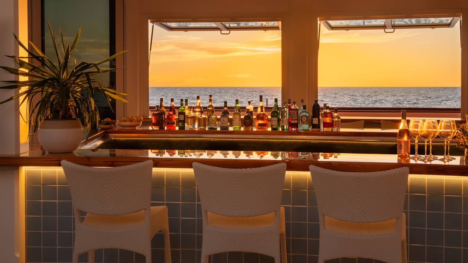 Bar with ocean view at sunset