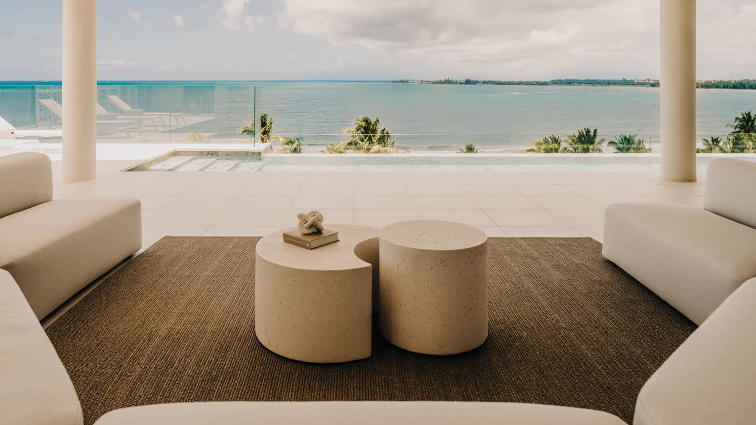 Modern rooftop pool terrace overlooking the ocean