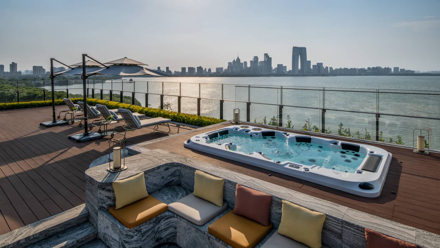 Rooftop deck with hot tub and lake view of Penthouse Suite at Four Seasons Hotel Suzhou