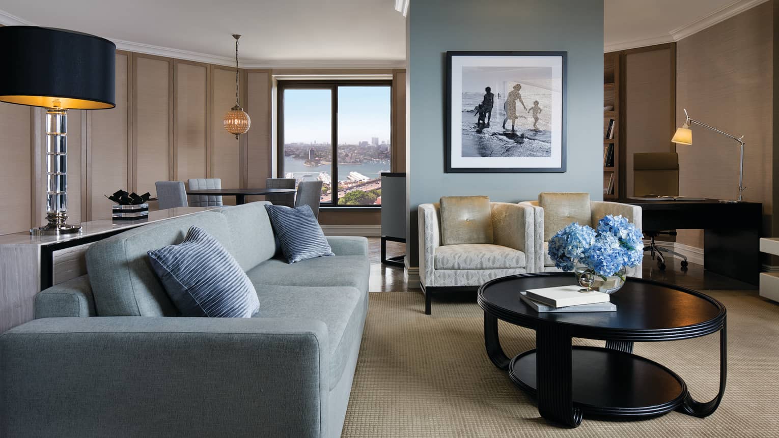 Deluxe Royal Suite blue sofa, armchairs around table