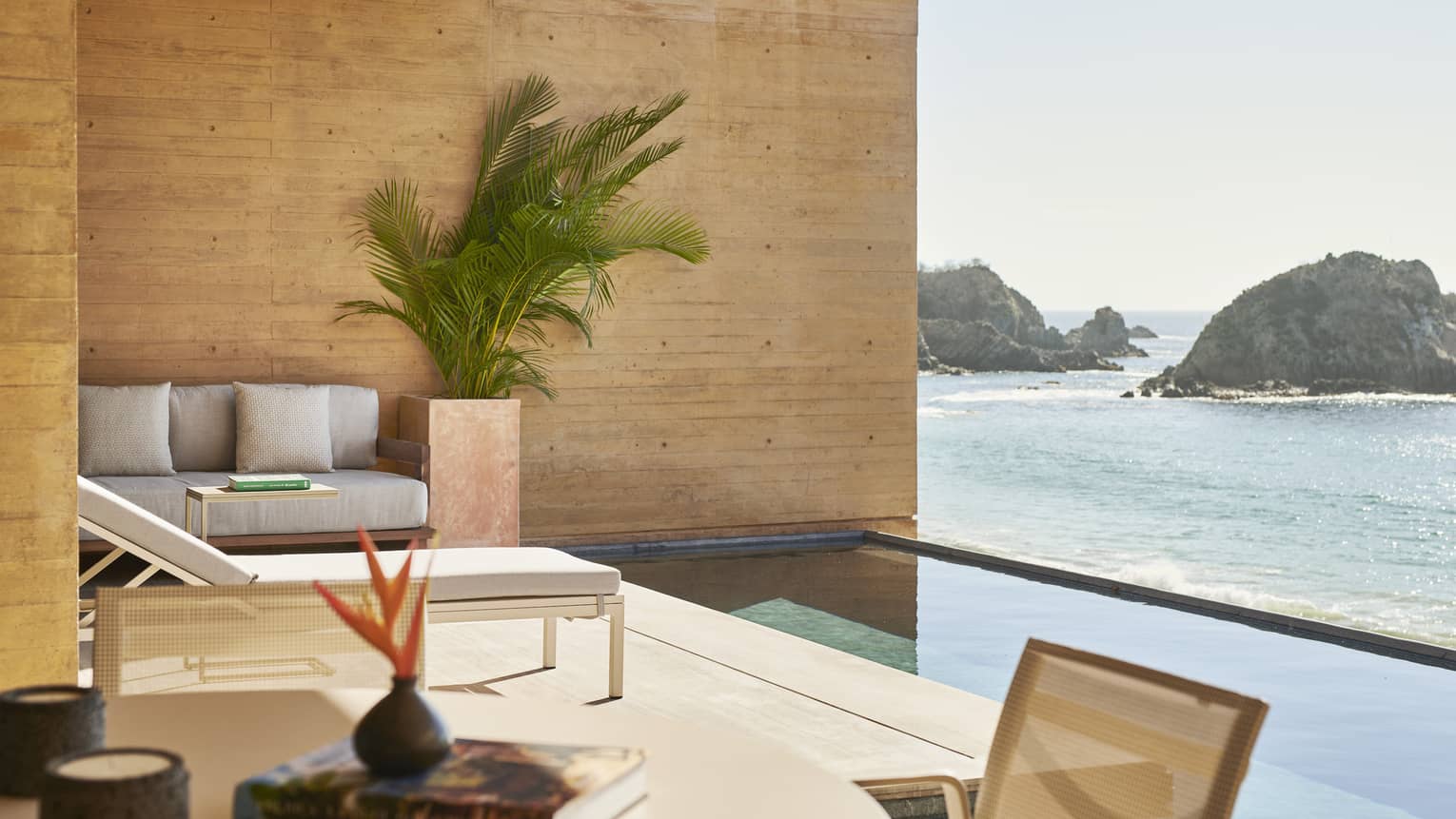 Private resort suite terrace with infinity pool and Tamarindo beach view