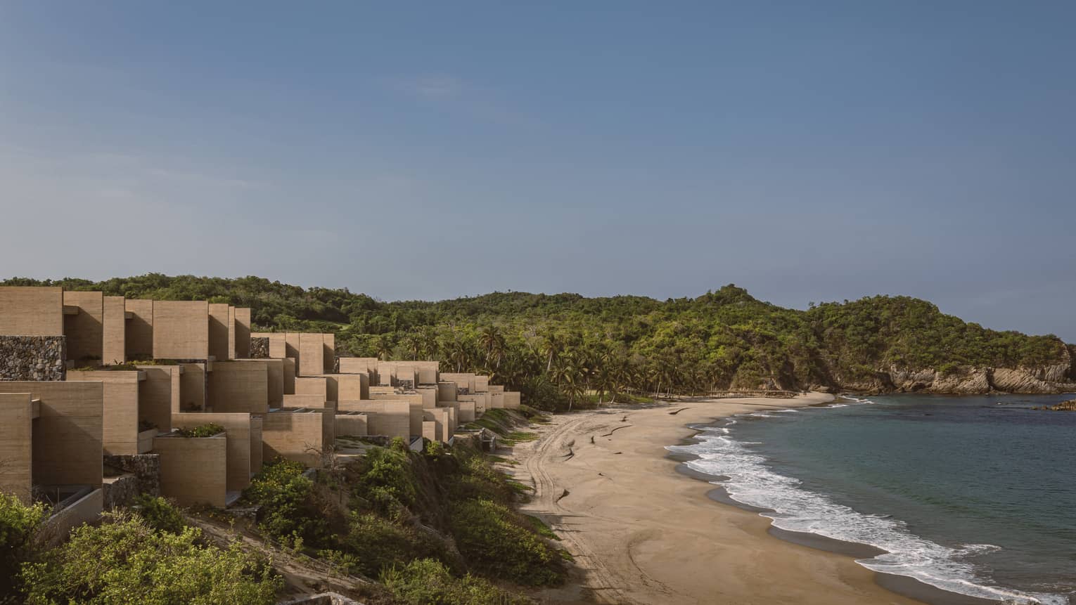 Ocean, beach and resort buildings