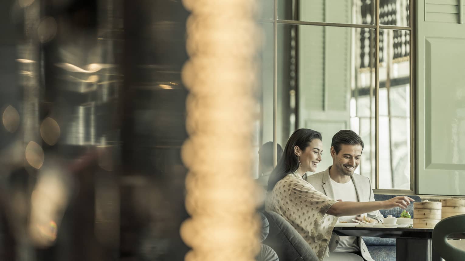 A couple enjoys a meal together at Yun House