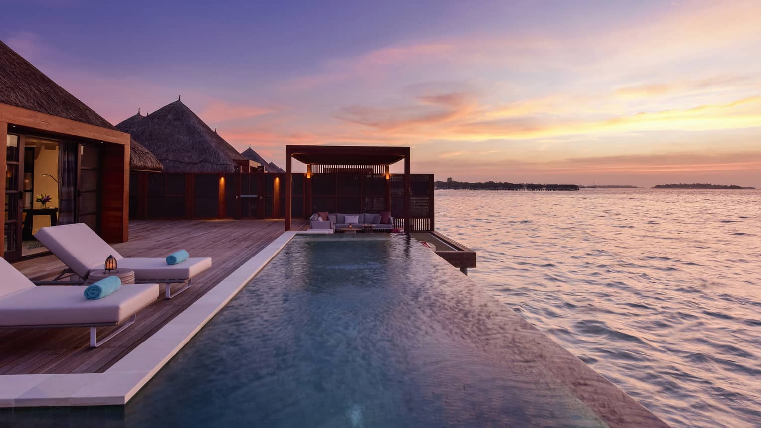 Madives villa with infinity pool at the water's edge