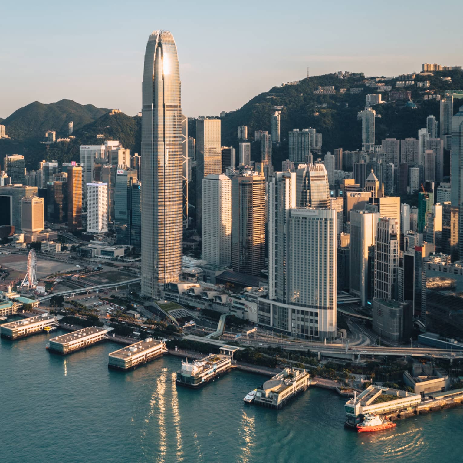 Hong Kong harbour and city buildings aerial shot