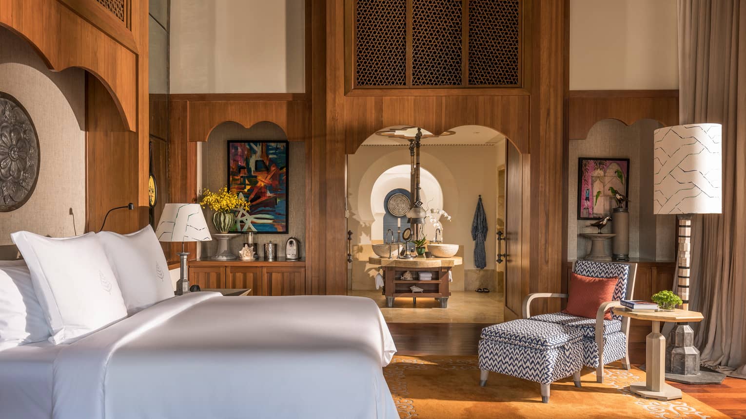 Partial Sea View Upper Floor Pavillion bed, door to bathroom with double sink vanity