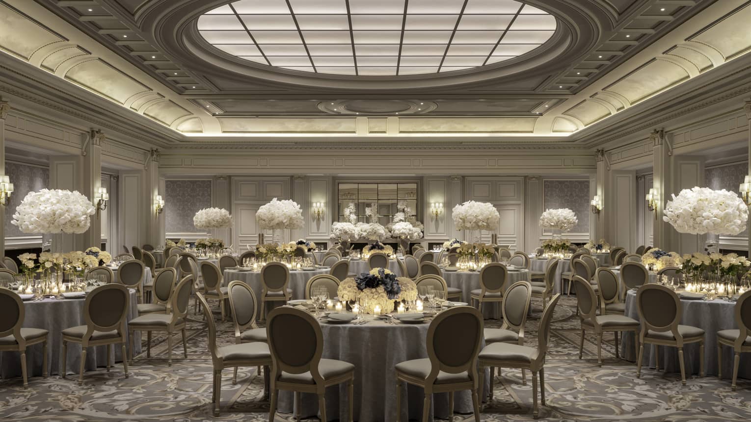 Elegant Paris banquet room, dining tables with white floral centrepieces under decorative domed ceiling