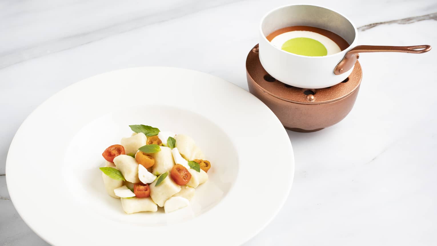 Gnocchi alla Caprese ? Handmade Potato Gnocchi, Arlequin Sauce, Mozzarella Cheese, Sun-dried Tomatoes, Basil Leaves
