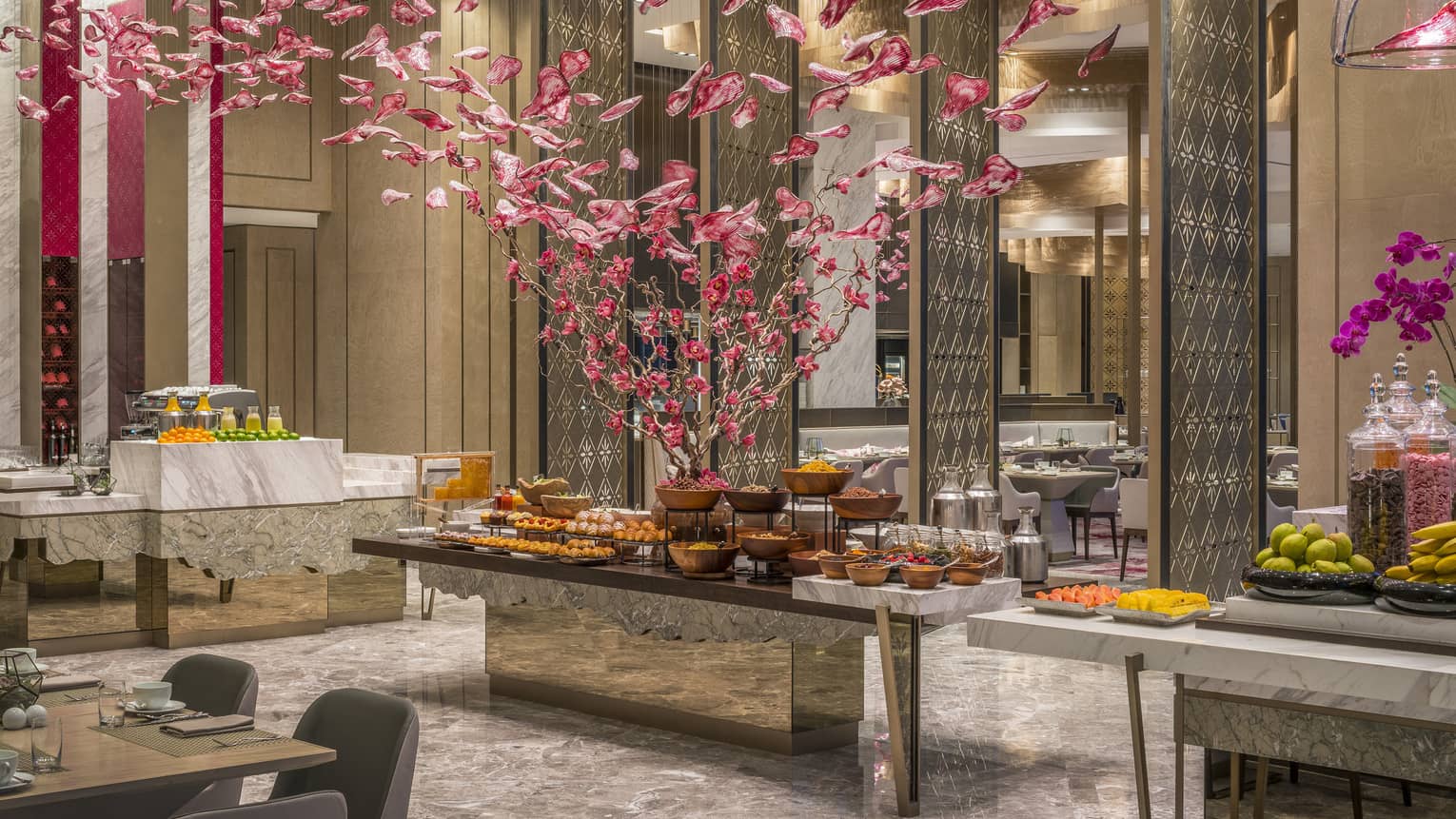 Curate buffet with floral arrangement