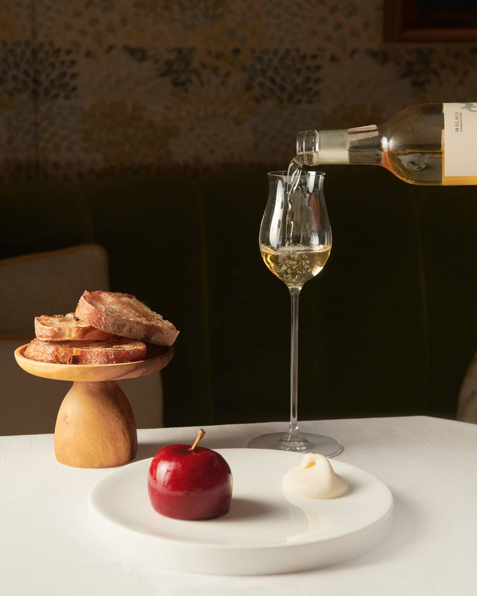 Glass of white wine and accompanying food