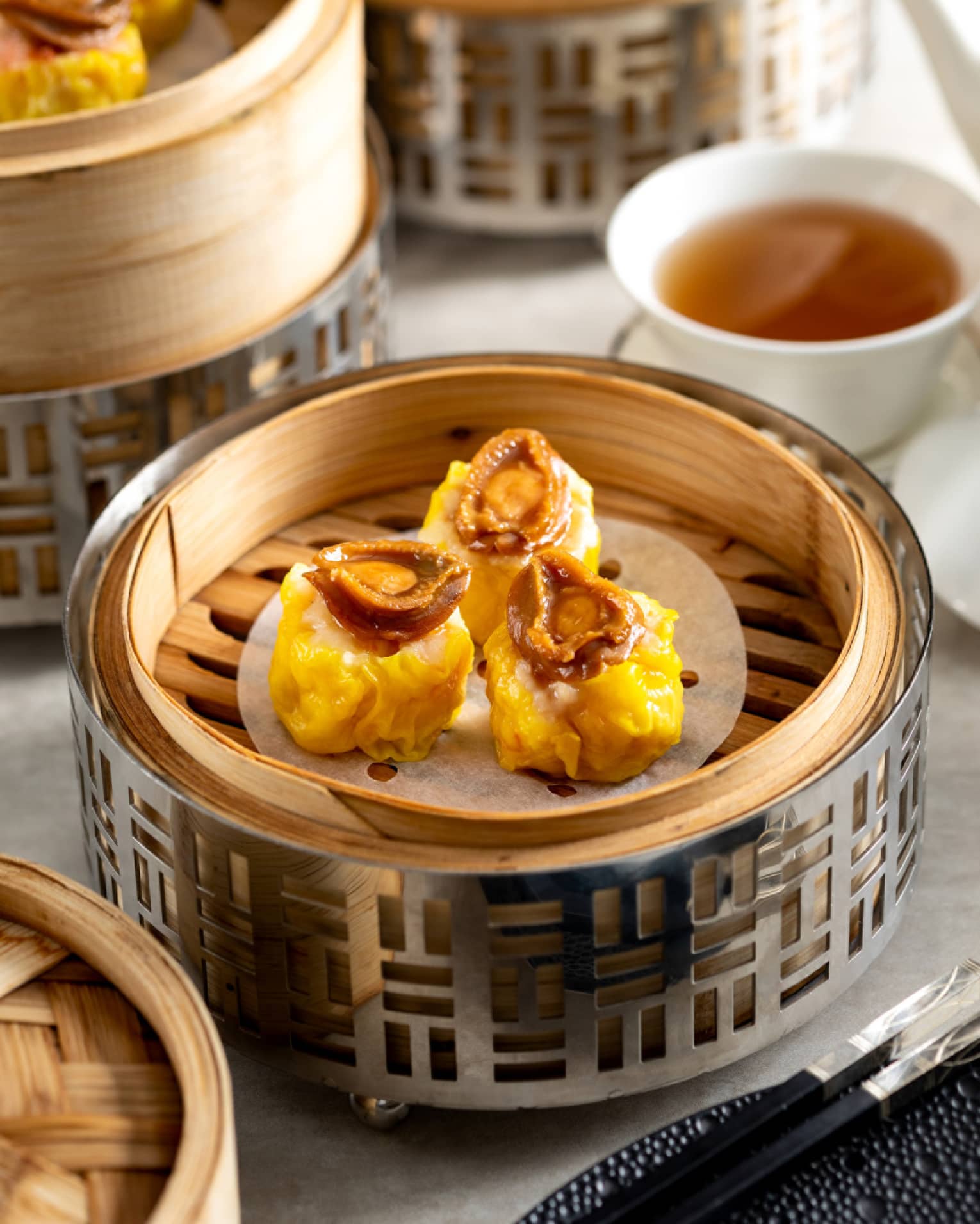Abalone Shumai, Prawns, Pork in steamer basket