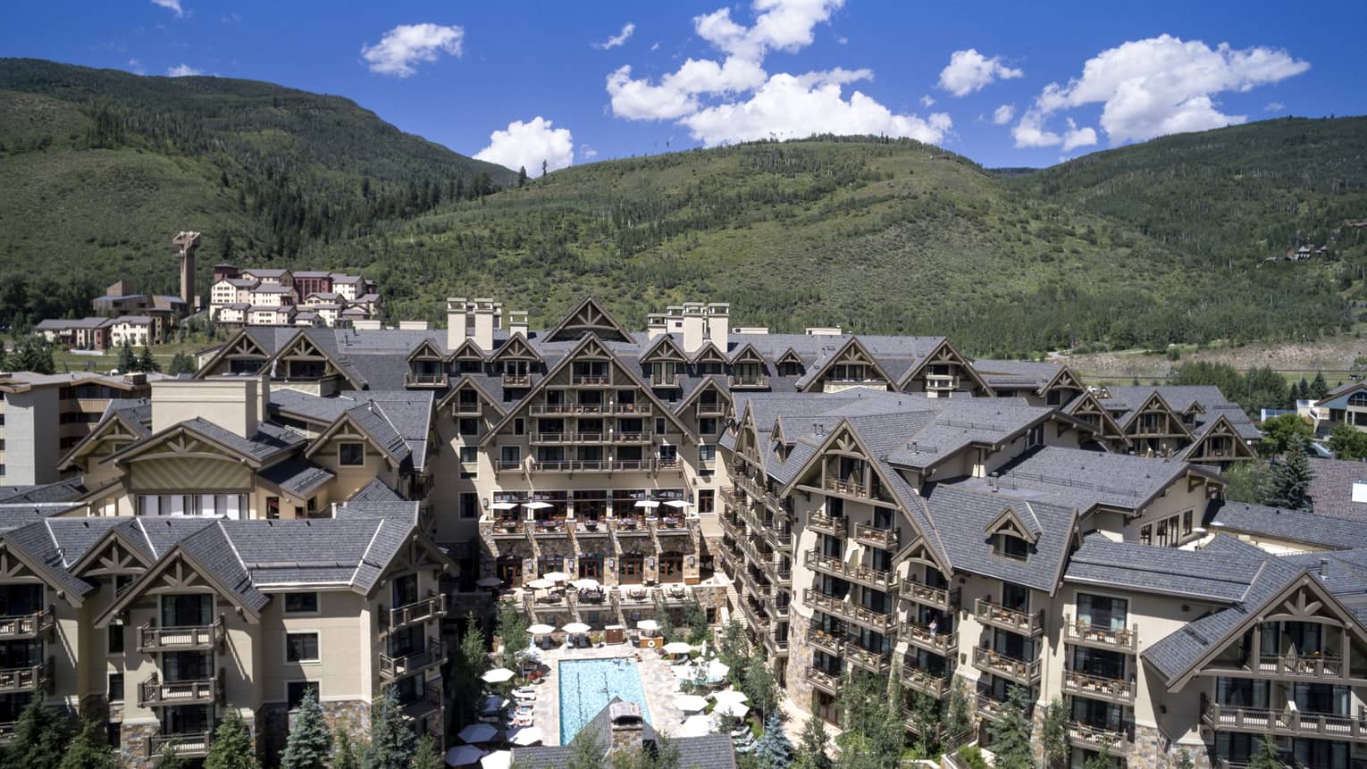 Hotel building in a green valley.