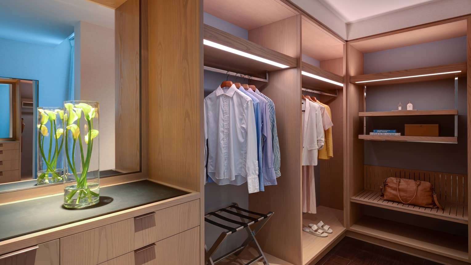 Walk-in closet with built-in wooden dresser