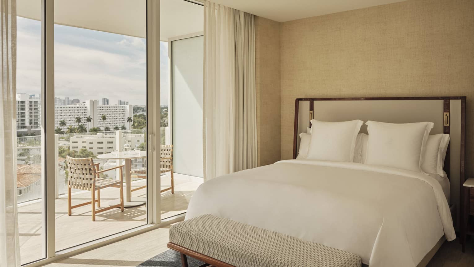 Bedroom with glass doors to balcony
