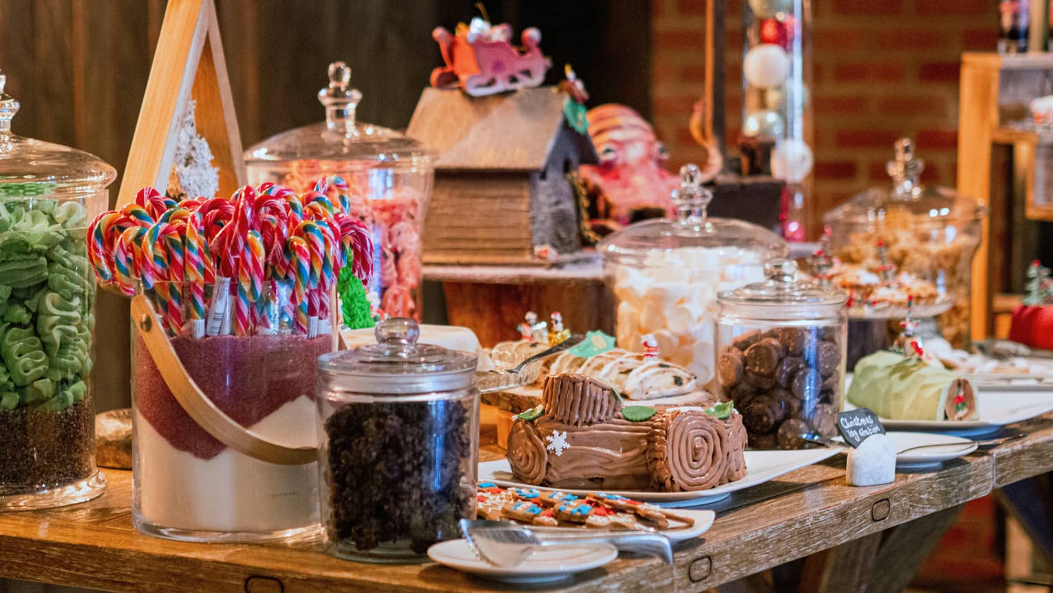 Christmas confections and candy canes in glass jars