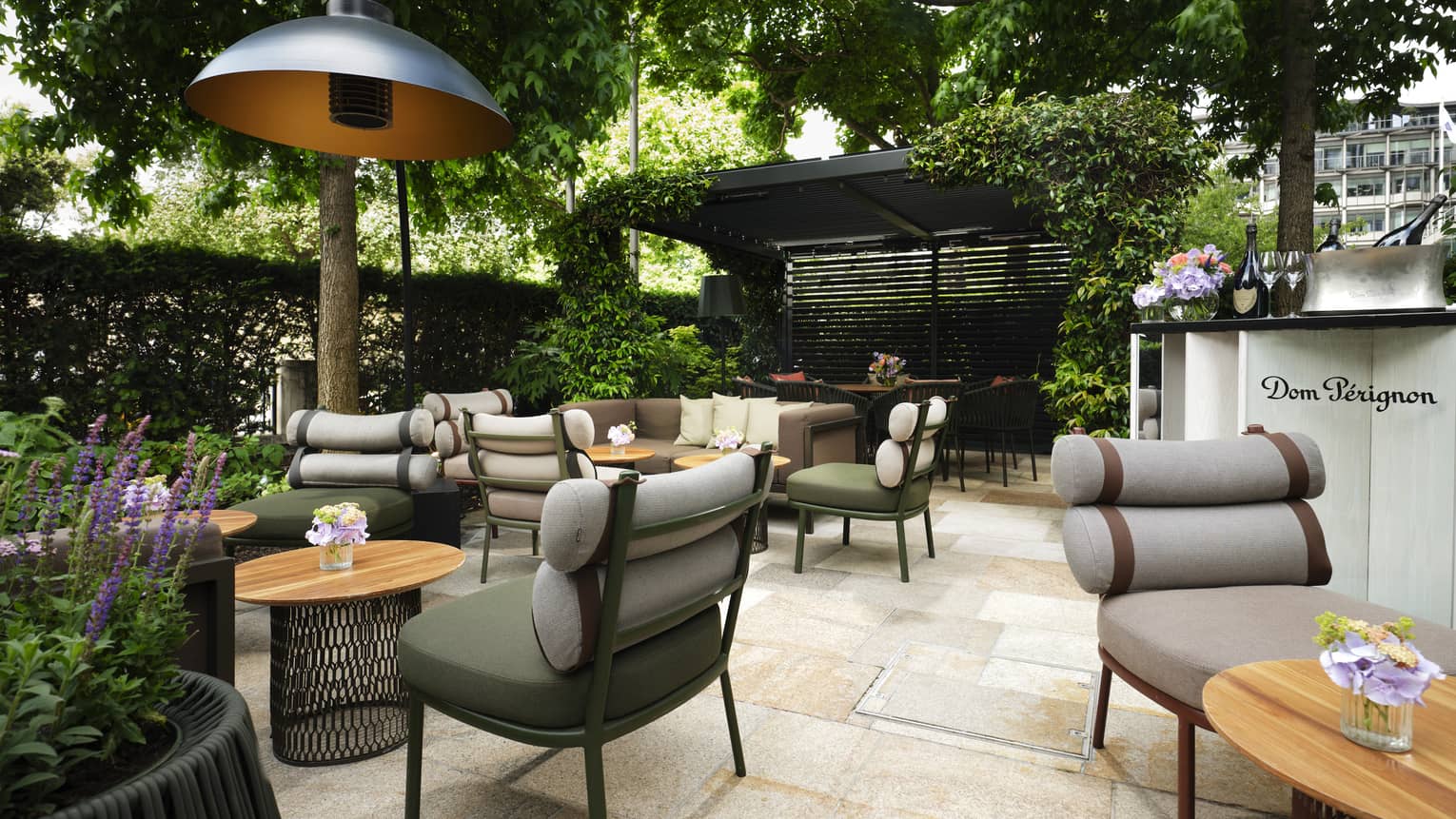 On The Terrace patio seating under canopy of trees