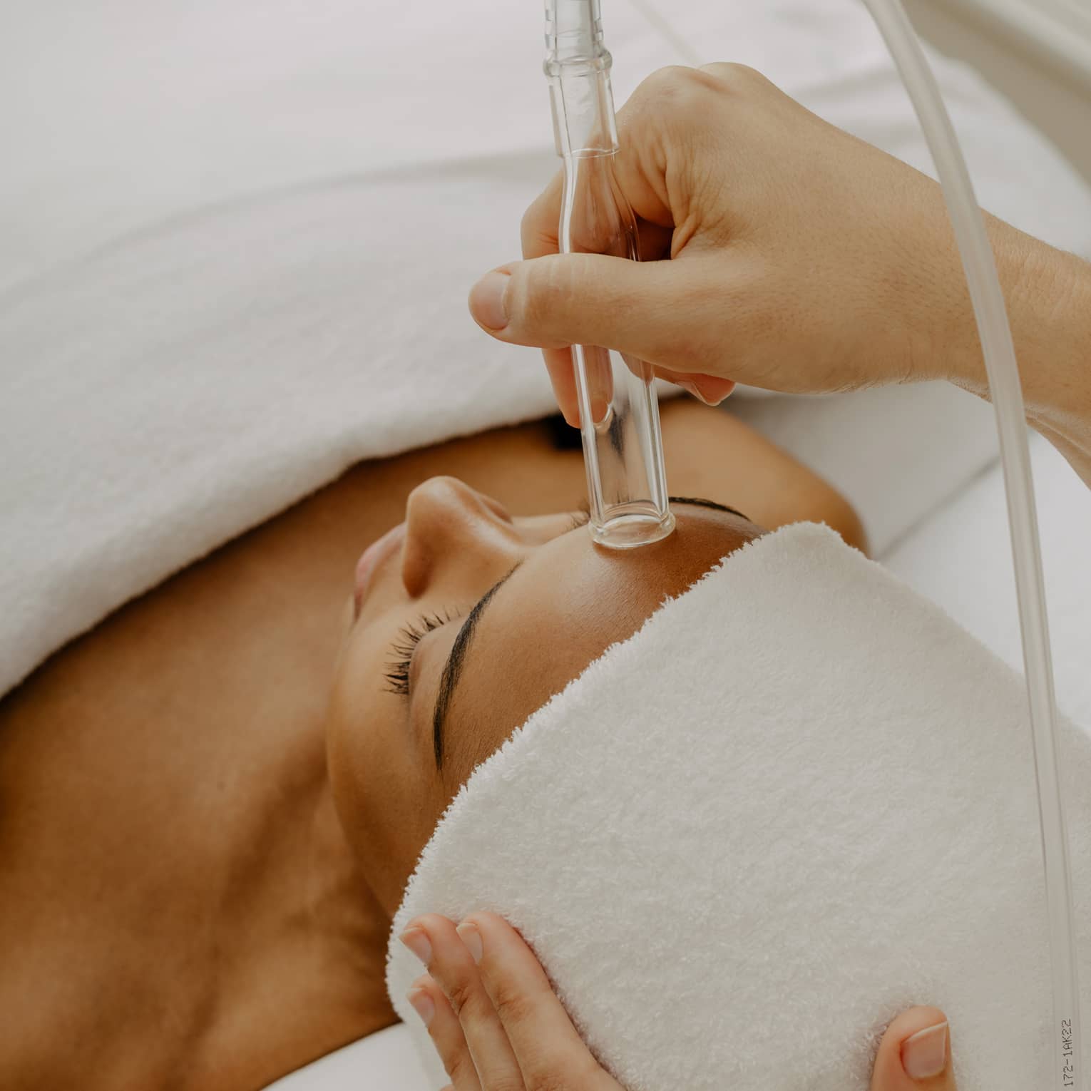 Woman gets a HydraFacial at spa