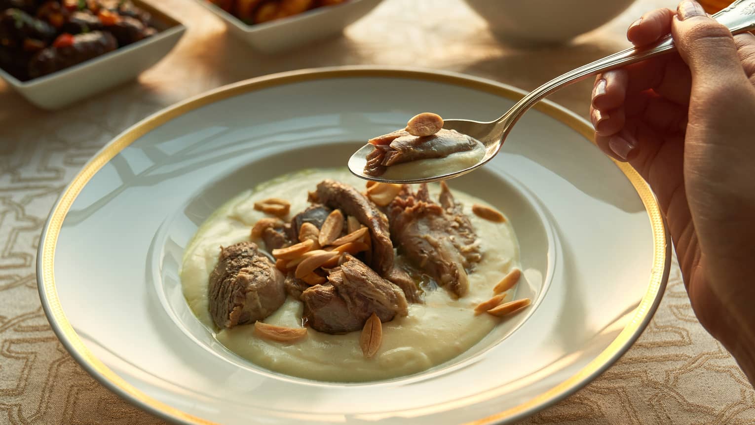 Traditional Egyptian porridge with lamb and slivered almonds