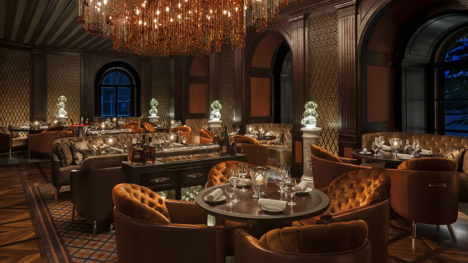 Percorso St Petersburg Italian Restaurant Four Seasons Hotel Orange Velvet Armchairs Brown Leather Sofas Under Elaborate Chandeliers In Porcorso Lounge