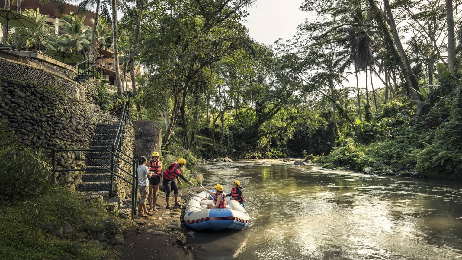 Guests disembarking from a raft after a river adventure in Bali