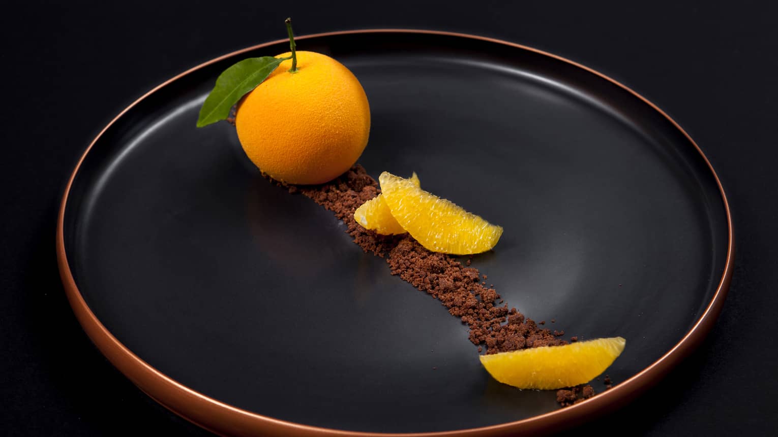 The Orange Signature Dessert served with cinnamon 