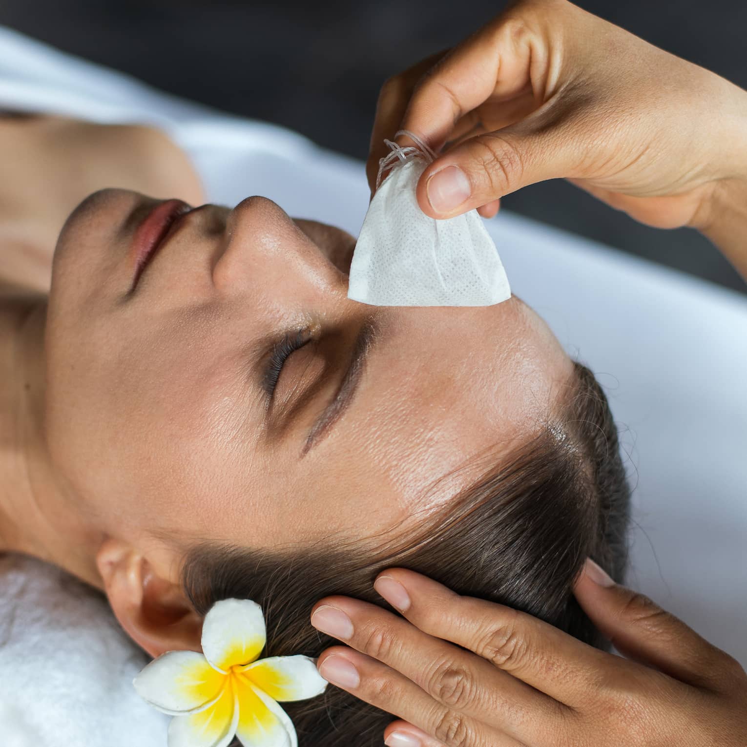 Woman receives Pearl Radiance facial