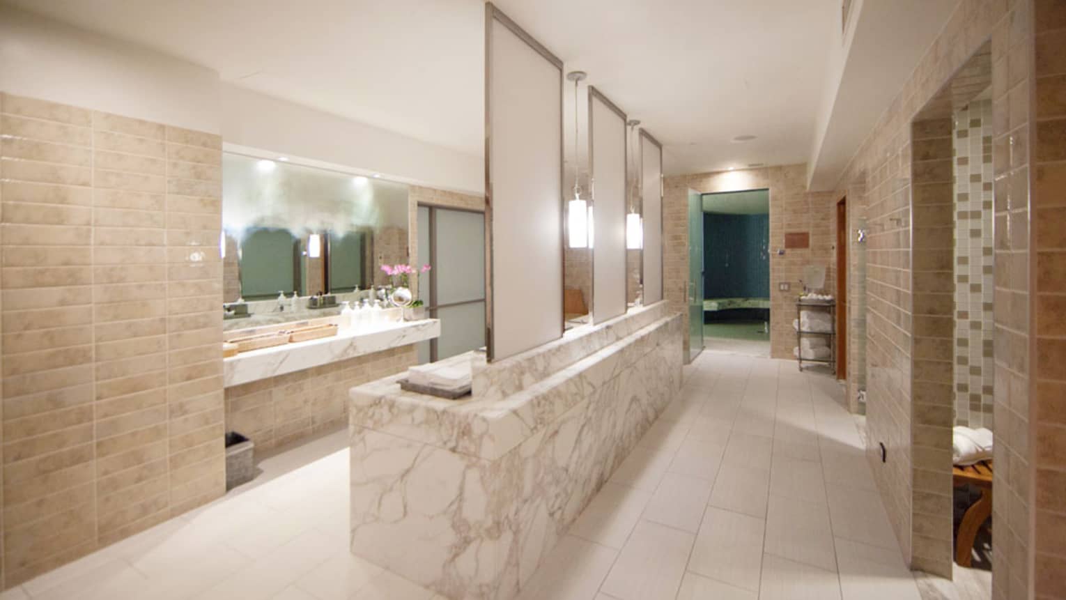Long white marble spa change room