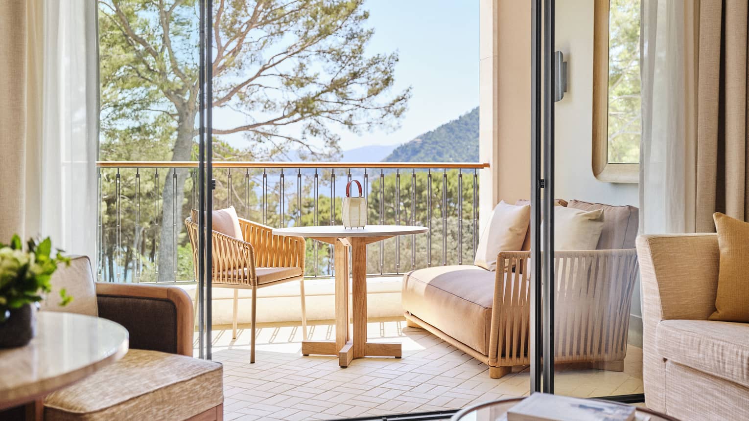 Garden-view hotel room terrace at Four Seasons Resort Mallorca
