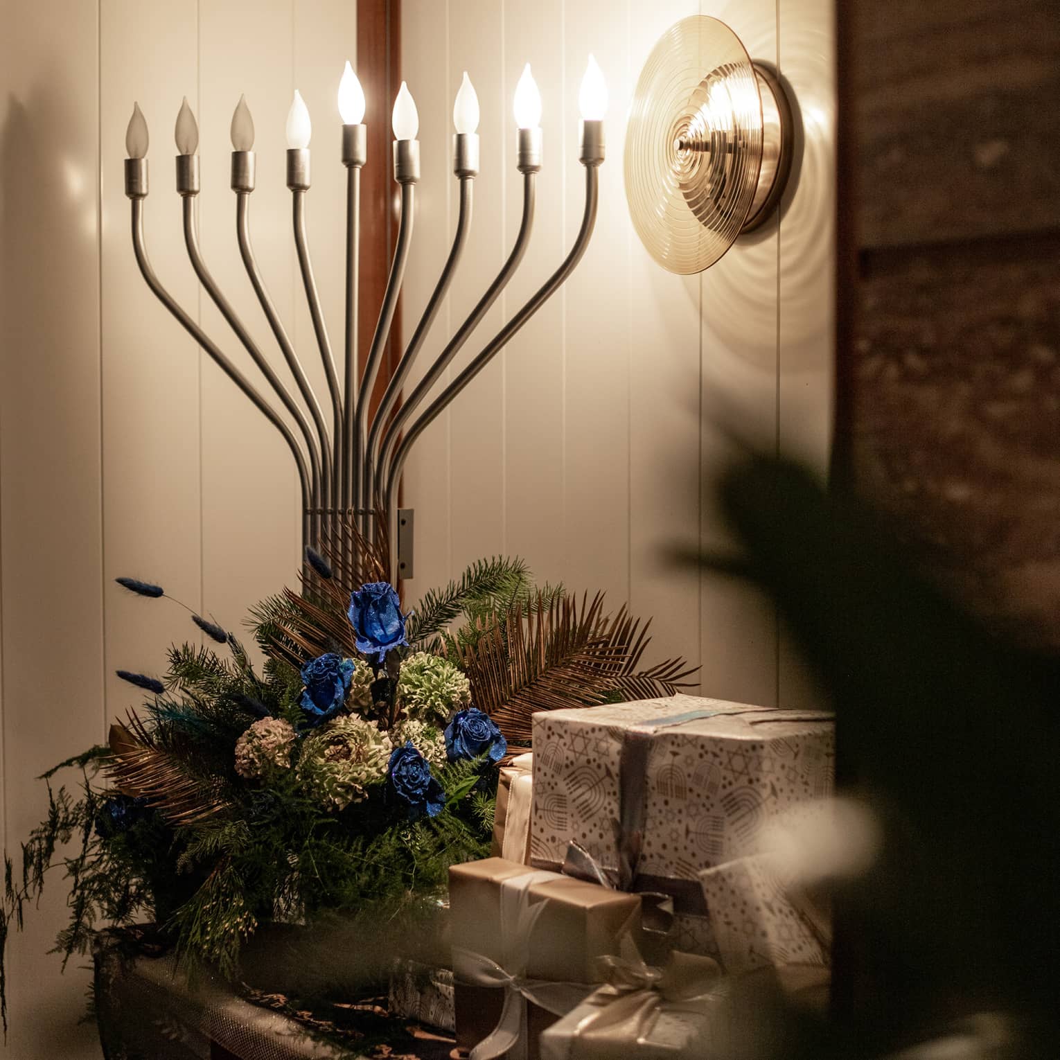 A menorah in a dimly lit room.