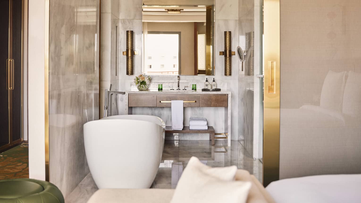 Hotel room bathroom with freestanding tub