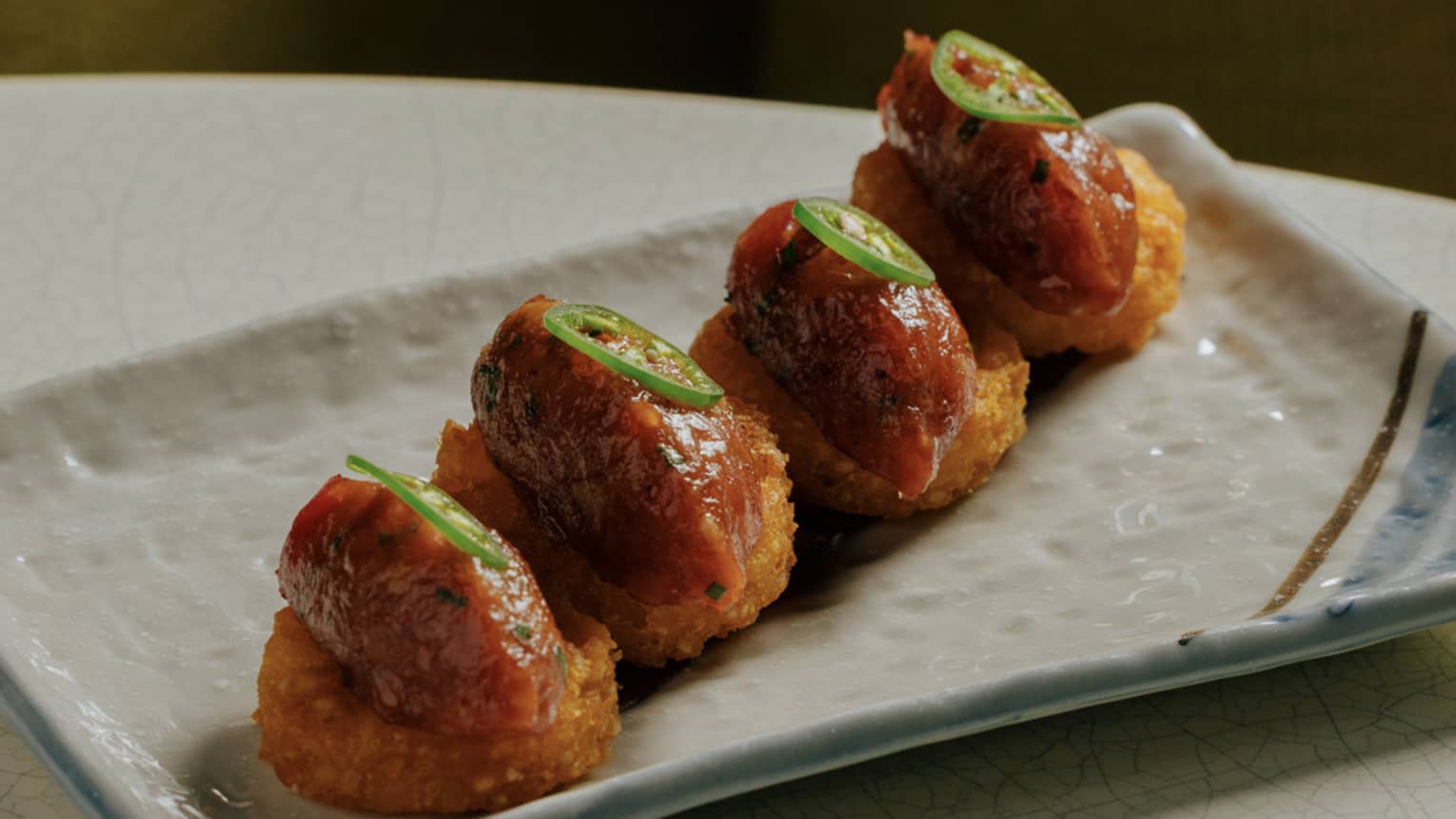 Four pieces of Tuna Arancini