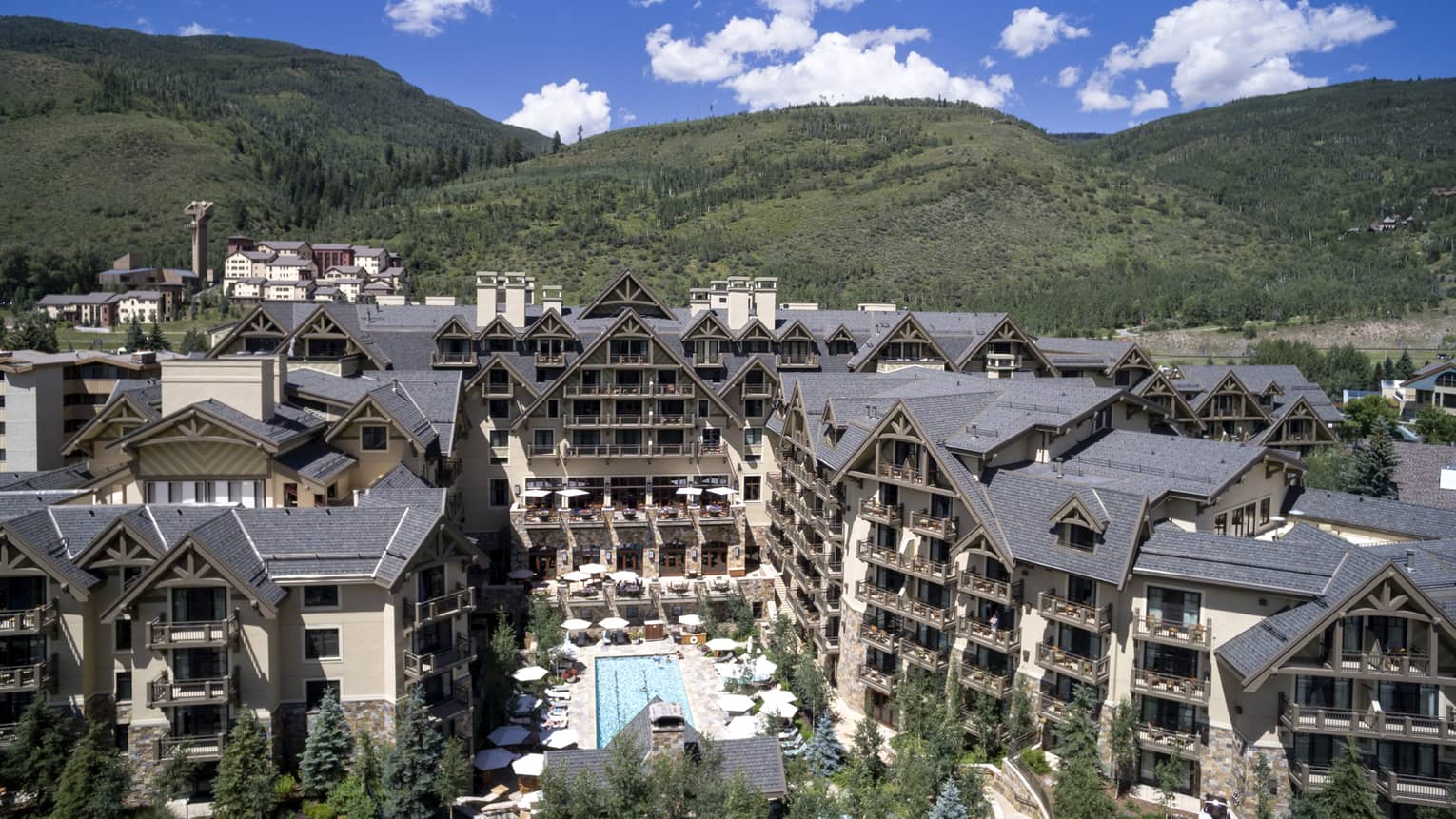 Hotel building in a green valley.