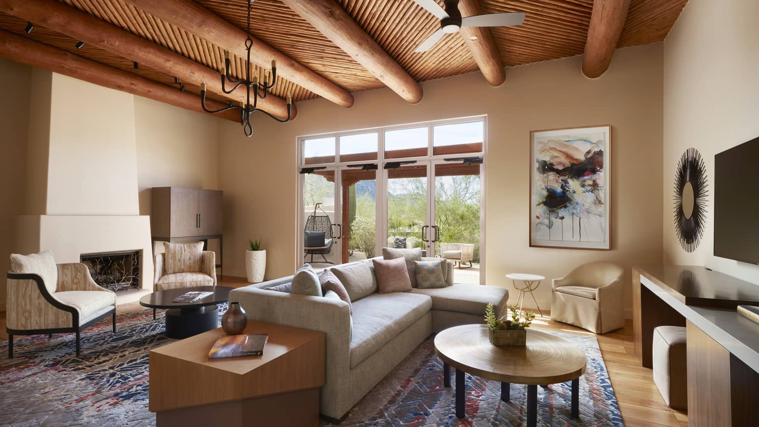 Prescott Suite seating areas under beam ceiling with small fan