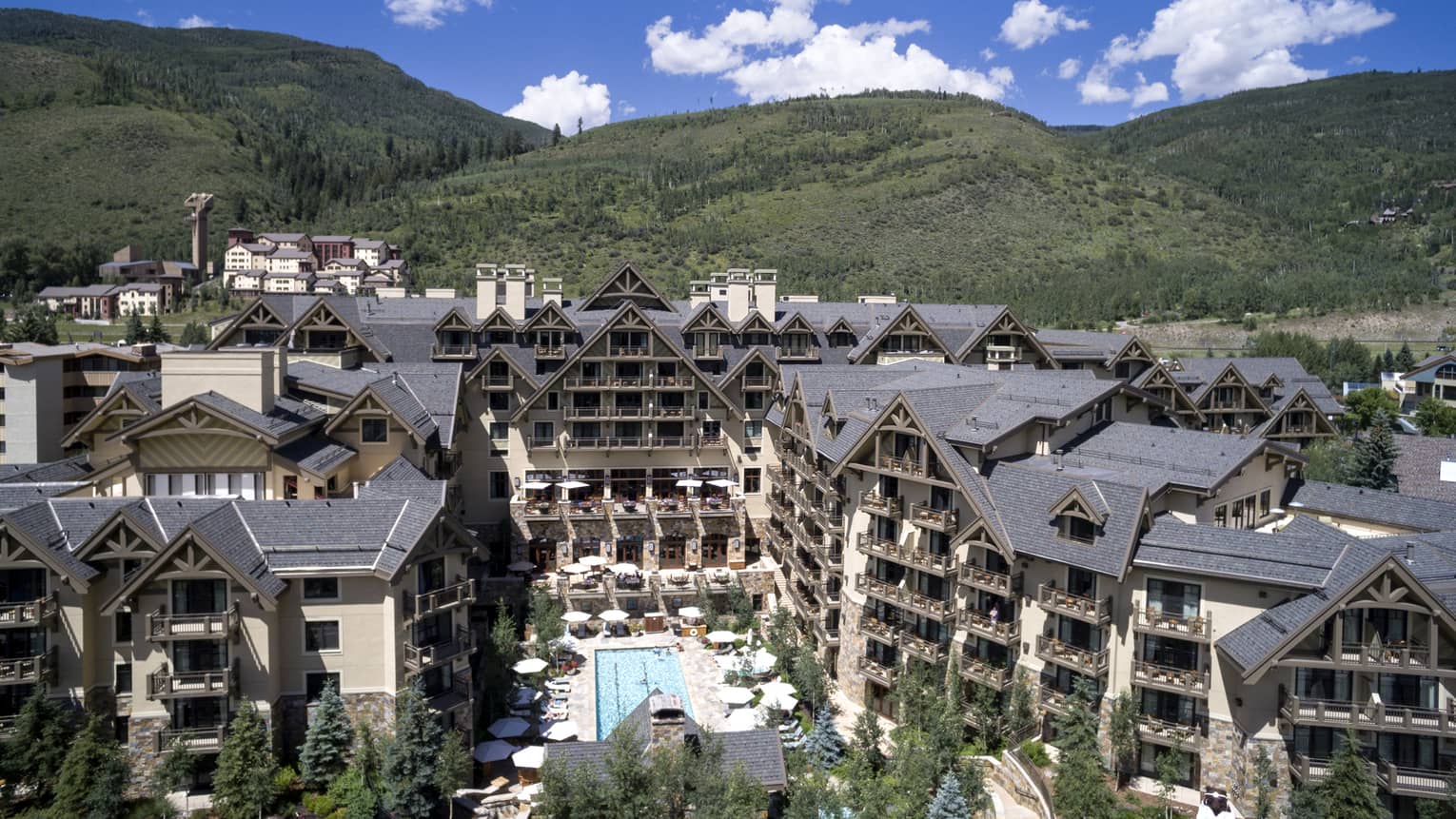 Hotel building in a green valley.