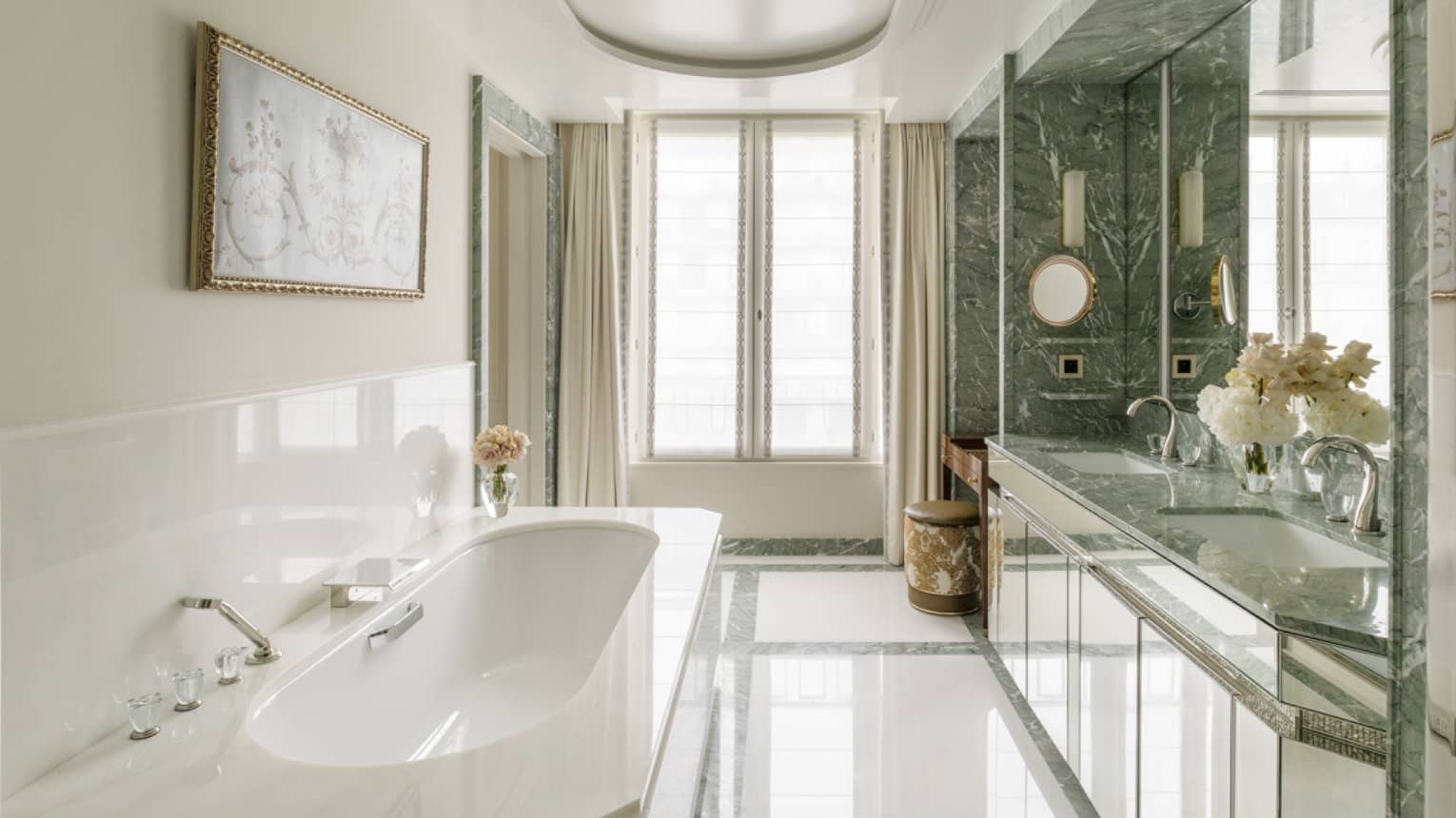 Grand Premier Suite elegant bathroom with tub at Four Seasons Hotel George V, Paris