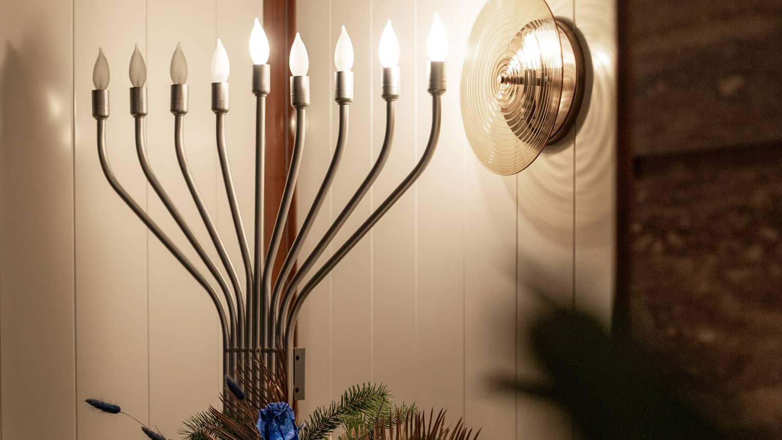 A menorah in a dimly lit room.