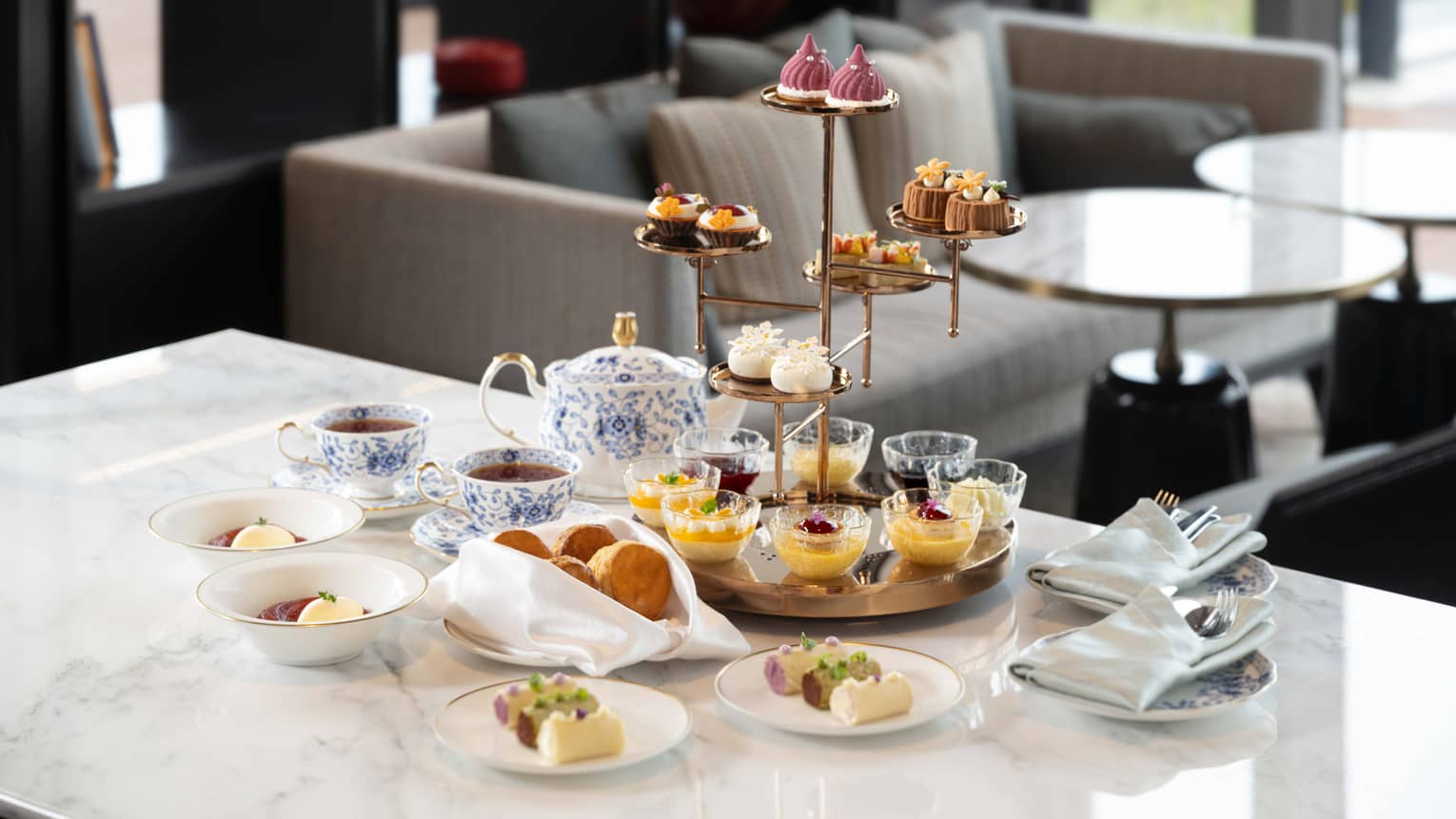 Afternoon tea set out on a marble countertop