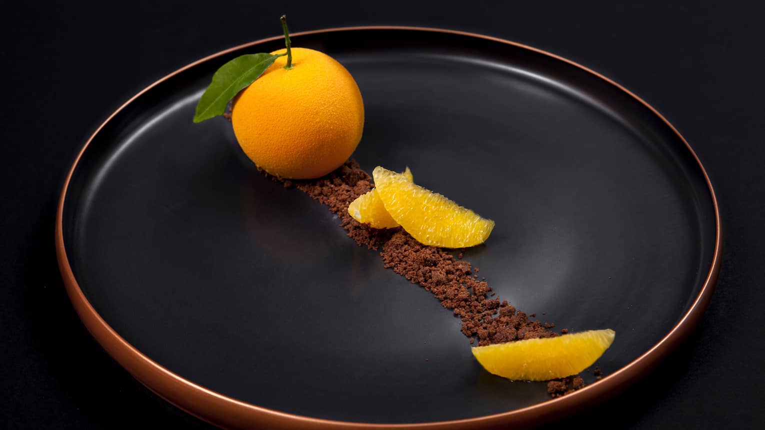 The Orange Signature Dessert served with cinnamon 
