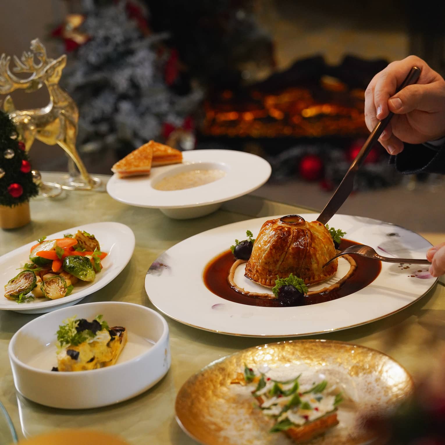 Festive gourmet dinner featuring Wellington