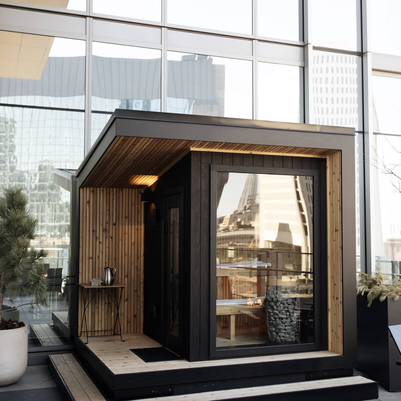 Indoor sauna with glass doors.