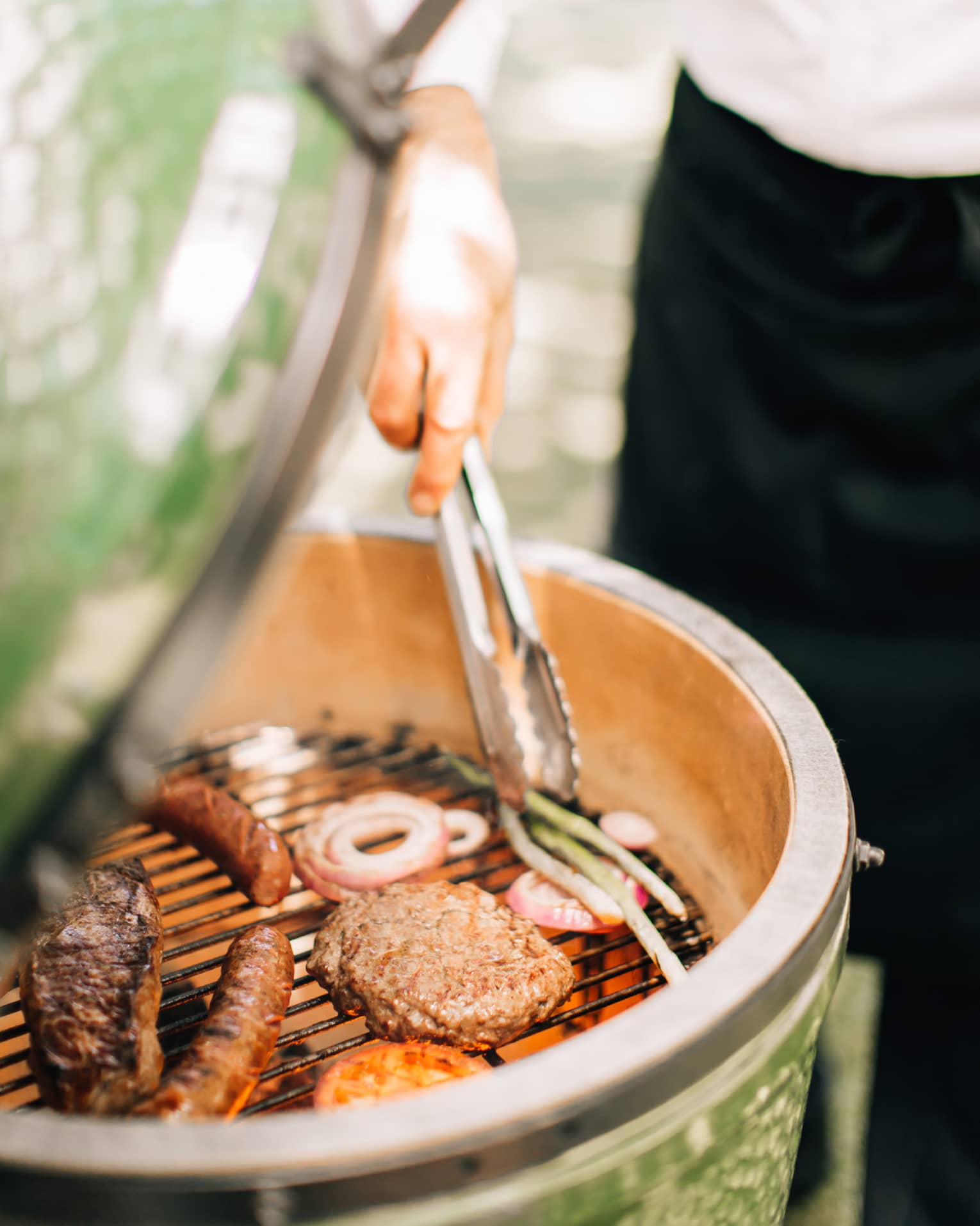 Food being grilled outside.