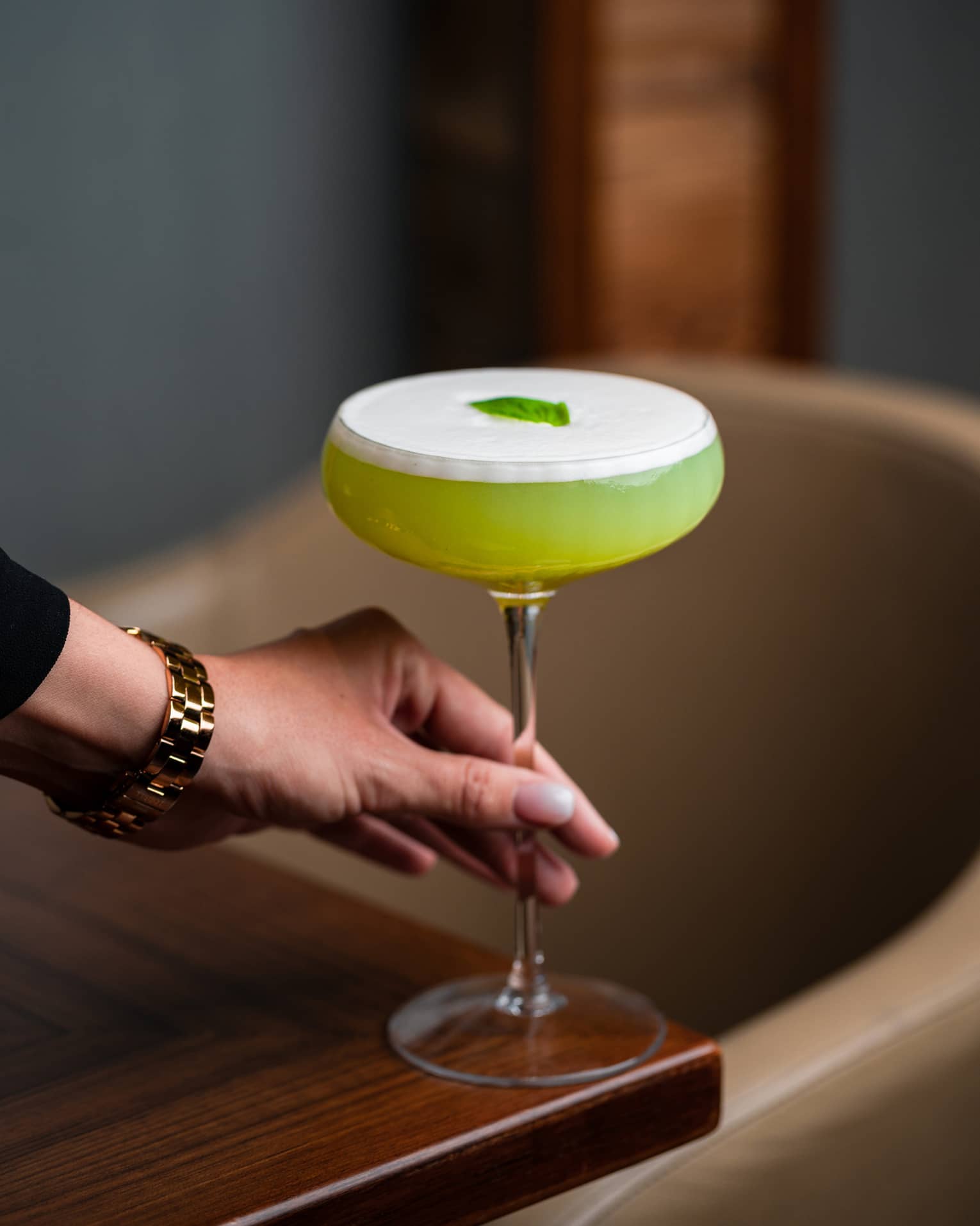 A bright green cocktail.