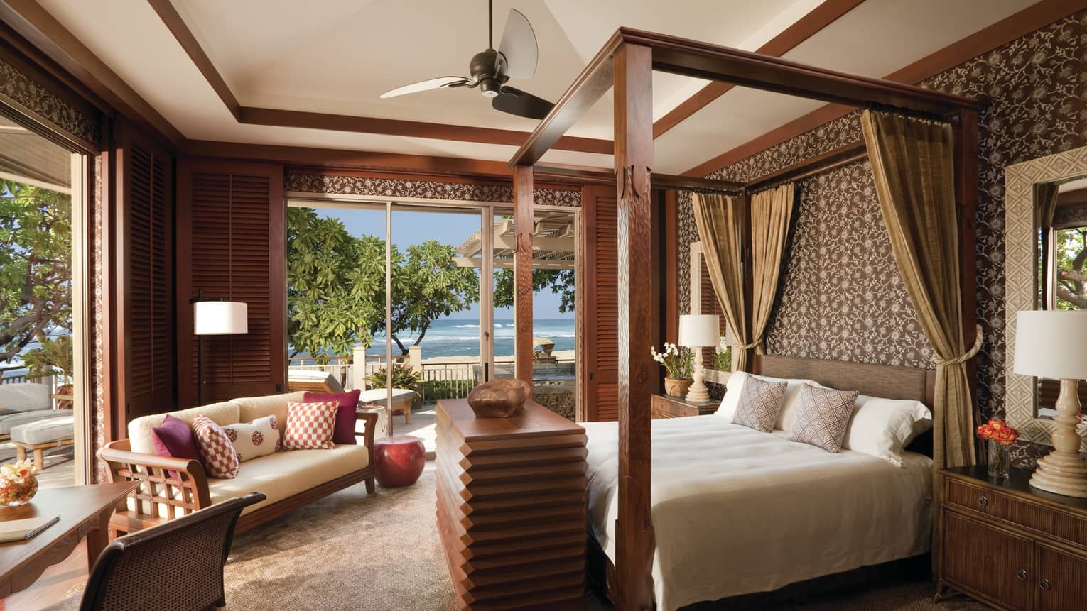 Hawaii Loa Presidential Villa sunny bedroom with wood poster bed, open walls