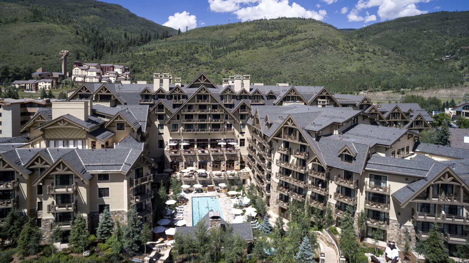 Hotel building in a green valley.