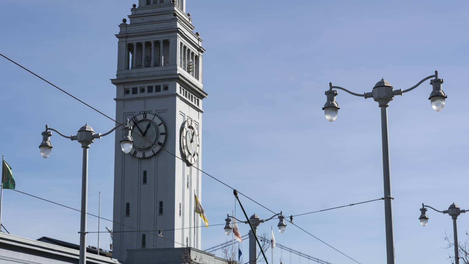 A trolley car passes by in front of the Ferry Building in San Francisco 
