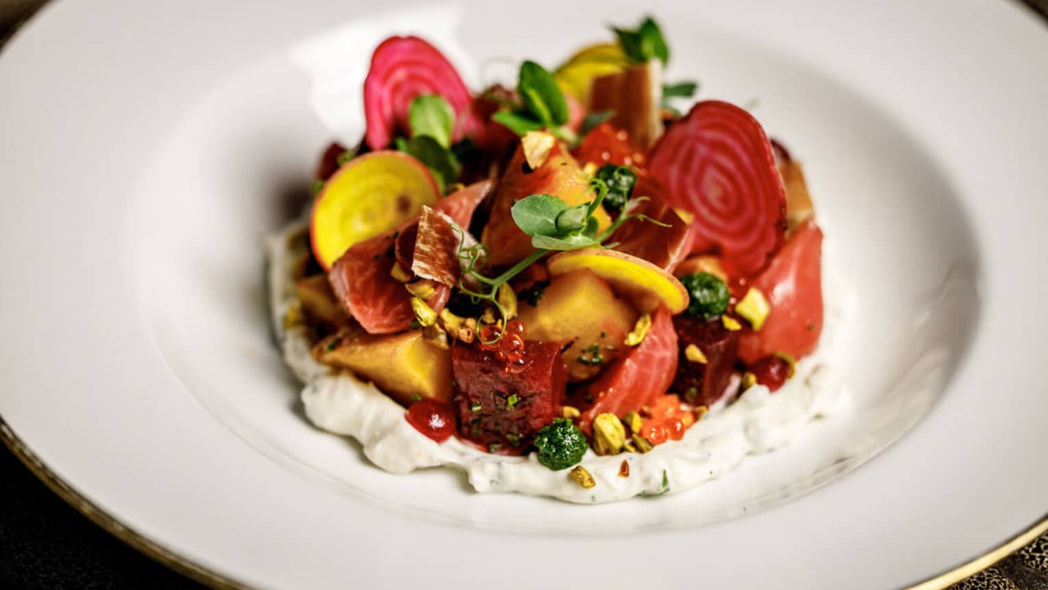 Roasted beets on a bed of Gournay cheese