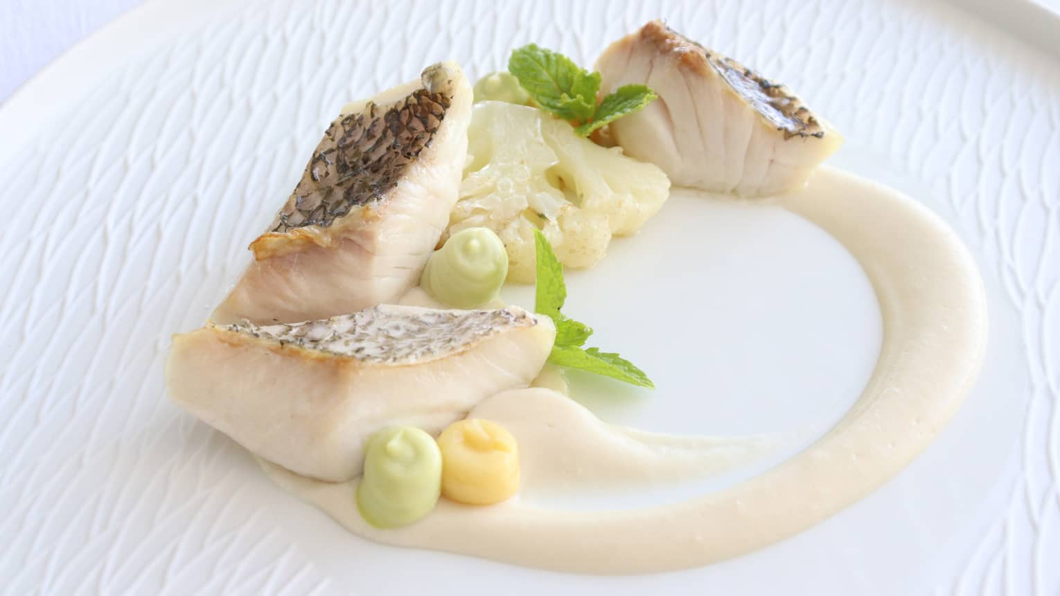 Slow-cooked Rainbow Runner with Cauliflower, Dill and Roasted Lemon