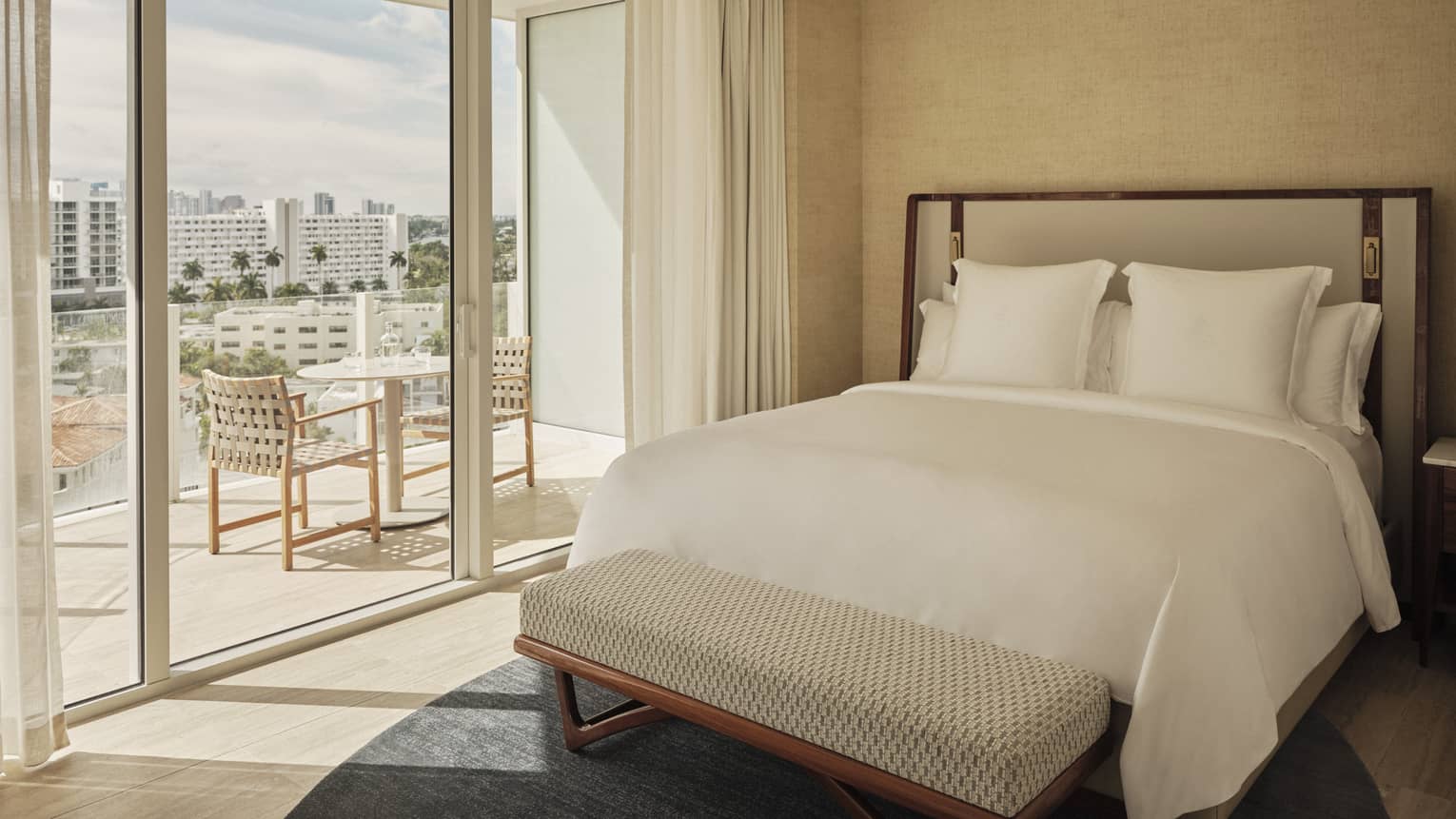 Bedroom with glass doors to balcony